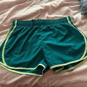 green athletic shorts